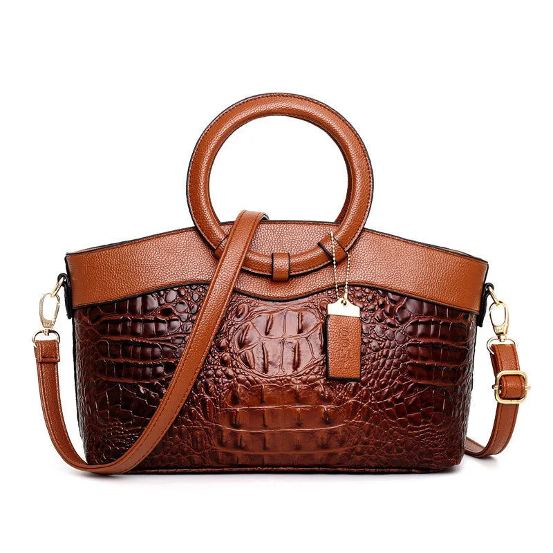 A casual fabric ladies handbag in one of six colours, showing external design and internal phone and ID pockets.