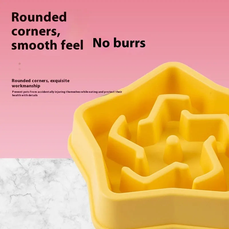 Yellow plastic dog slow feeder bowl with textured bottom and interior feeding obstacles