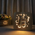 Square wooden LED atmosphere lamp with warm white glow and USB power cable