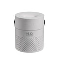 Green portable bedroom humidifier with USB charging cable and 1.1L water tank