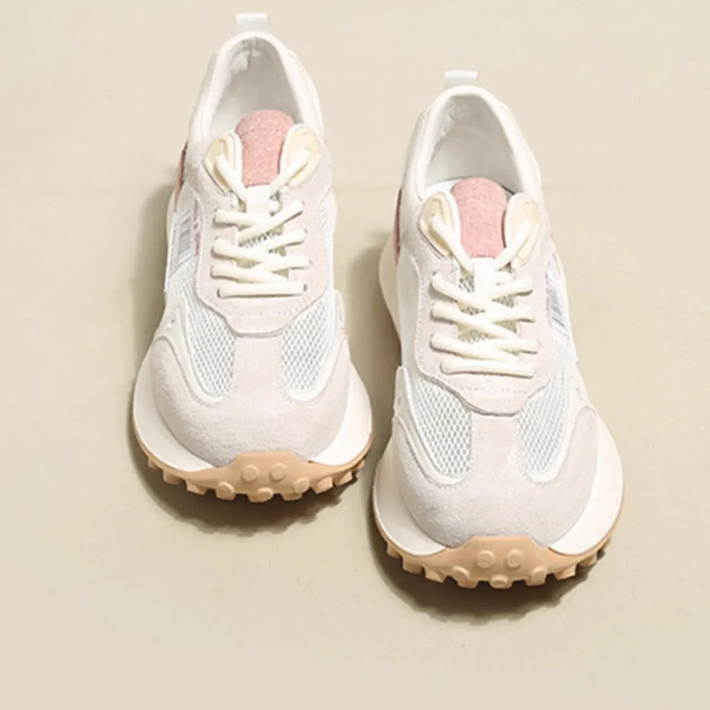 Women's gray and pink retro sneakers with mesh lining, rubber sole, and low-top design