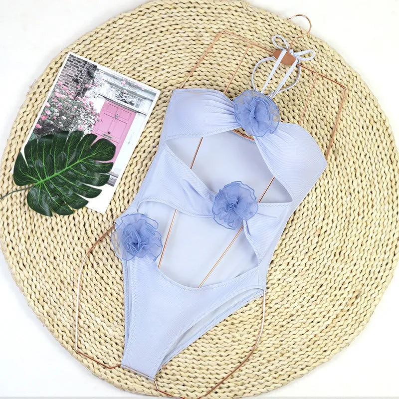 Women's black and blue stripe 3D floral one-piece swimsuit with bikini styling
