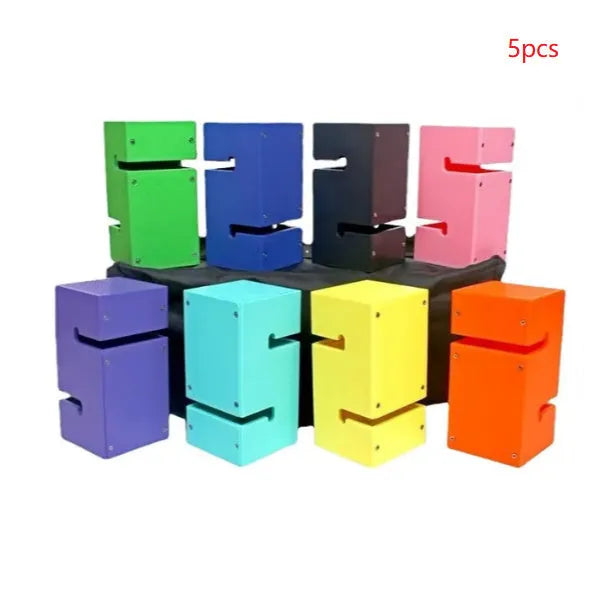 Set of coloured ABS plastic blocks, ropes, and a frame for outdoor group building games and team challenges.