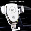 Black car wireless phone charger mounted on a vehicle vent, holding an iPhone.