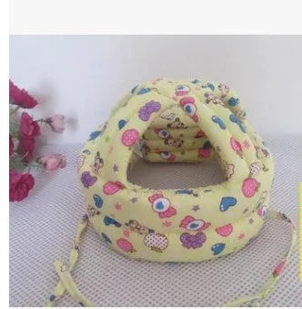 Baby anti collision hat with high-density sponge padding, adjustable headband, breathable cotton outer, colourful design
