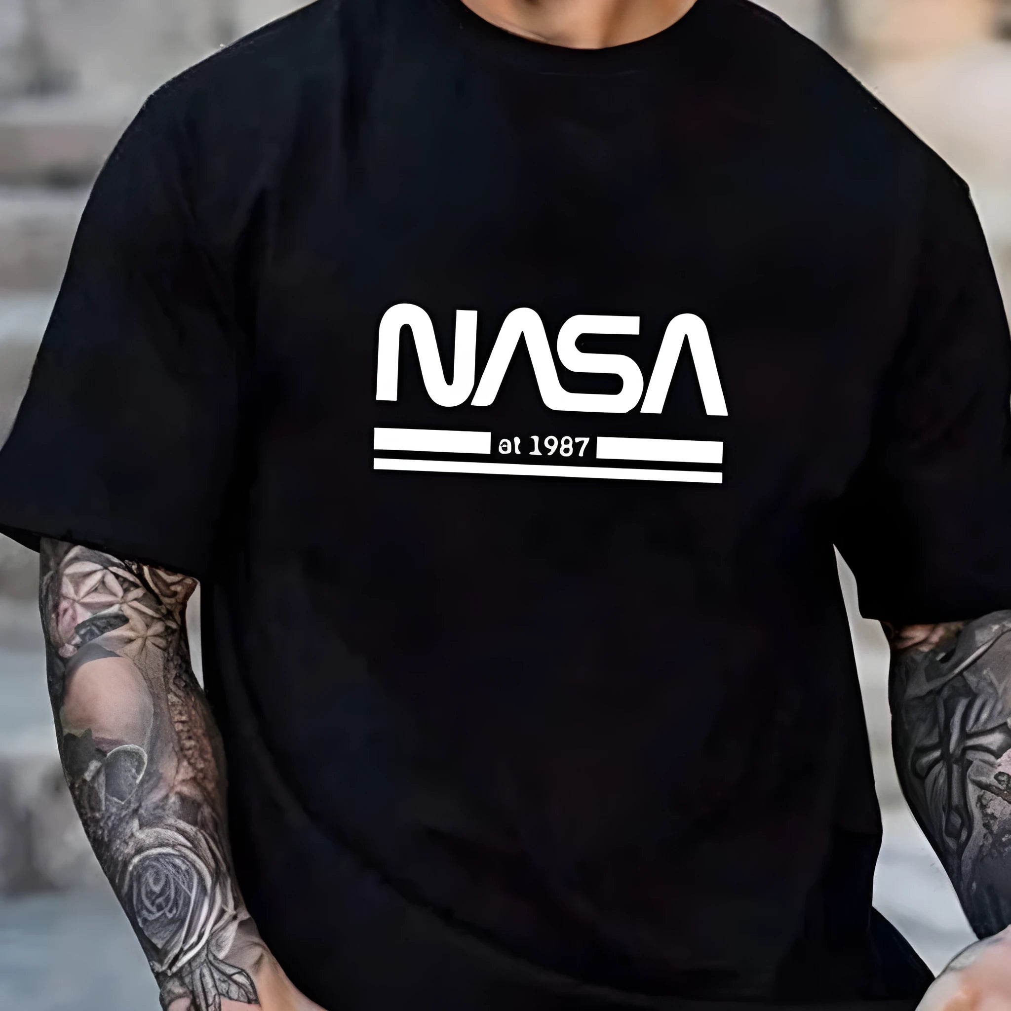 Slim-fit men's short sleeve cotton t-shirt on a hanger, available in multiple solid colours.