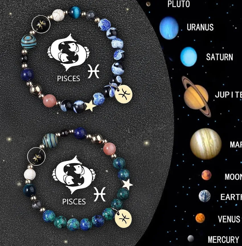 Two natural stone beaded bracelets with zodiac sign charms on a wrist