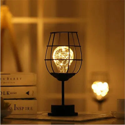 Decorative wrought iron table lamp in wine bottle shape with warm white LED lighting