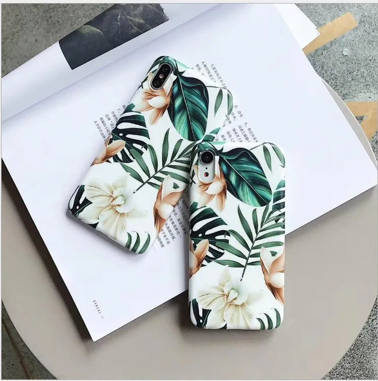 Floral banana leaf art design on a soft TPU phone case for iPhone models.