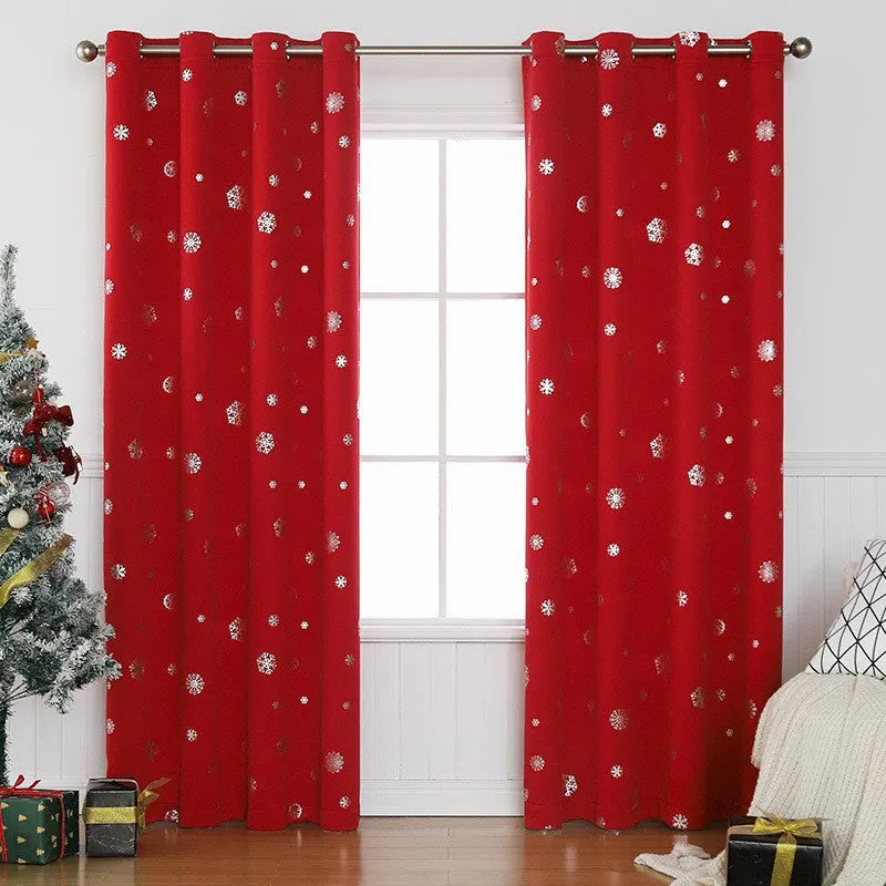 Red snowflake pattern shade cloth curtain with iron hoop hanging tabs.