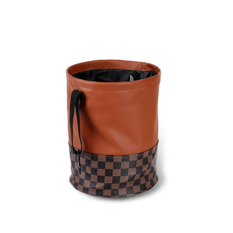 Retractable leather interior car trash can with handle shown in vehicle