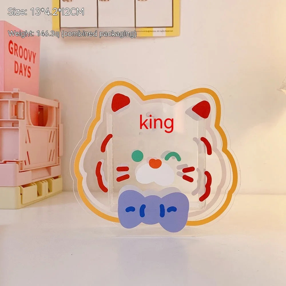 Clear square acrylic stationery storage box with lid in cute character design on desktop