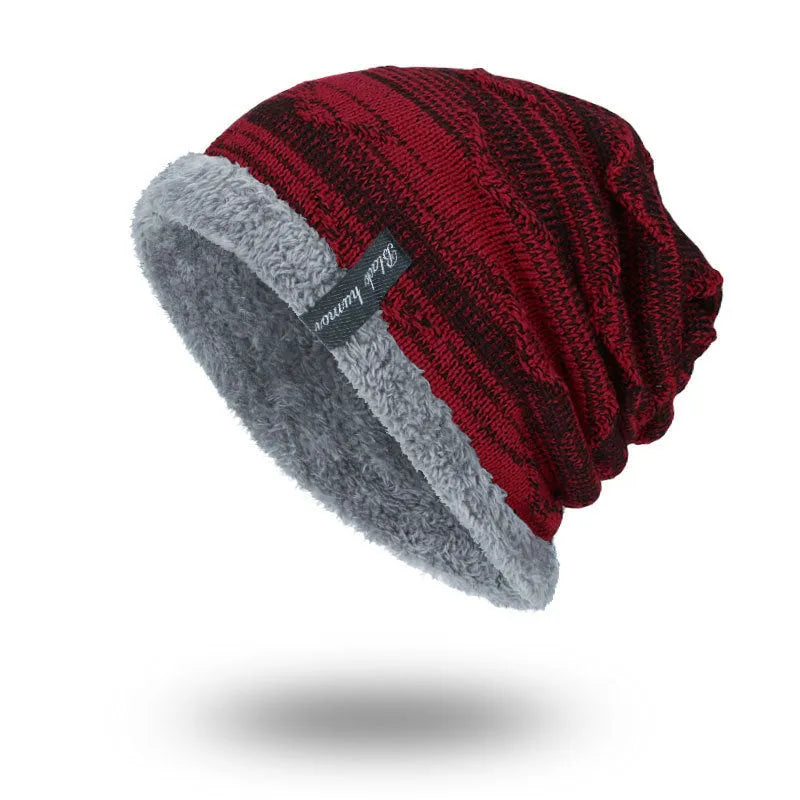 Diagonal hook knitted acrylic beanie in black, showing textured knit pattern