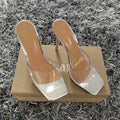 Women's black and silver high heel fashion boots with a PVC sole, showing the size options.