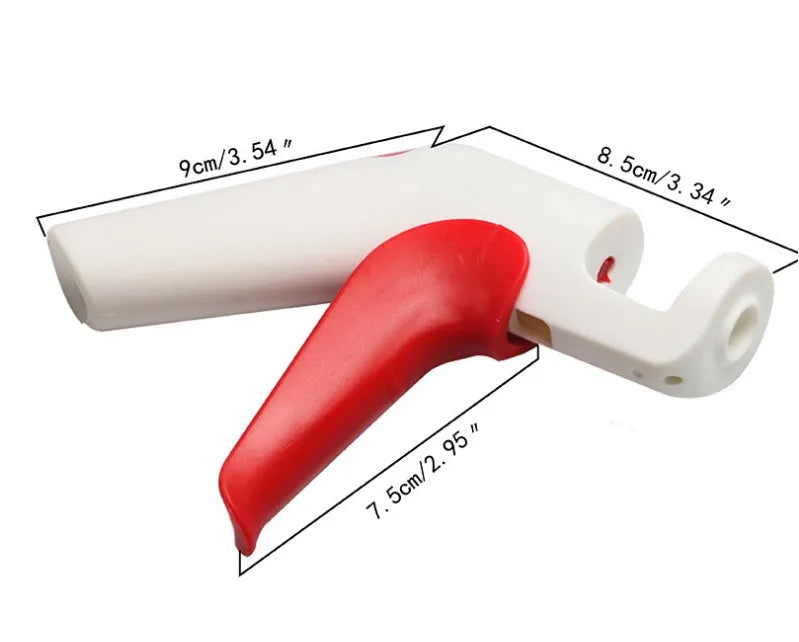Cherry and olive pitting tool with red silicone handles and stainless steel mechanism