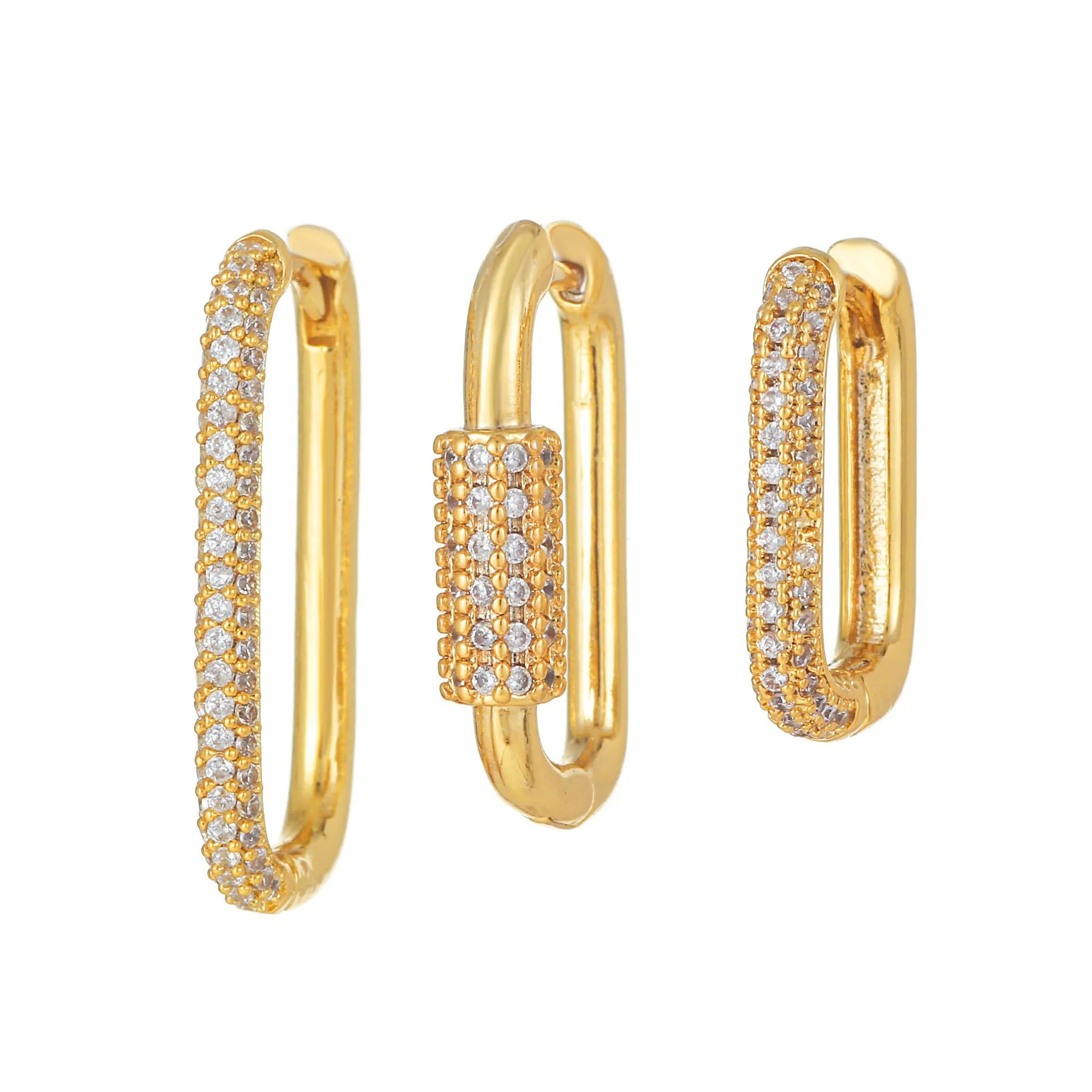 Three geometric ear clips with micro-inlaid zircon stones on copper, showing gold and white gold colour options