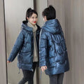 Women's loose fit hooded winter jacket in polyester blend available in four colours with Asian sizing.