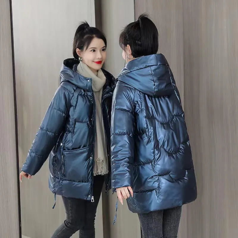 Women's loose fit hooded winter jacket in polyester blend available in four colours with Asian sizing.