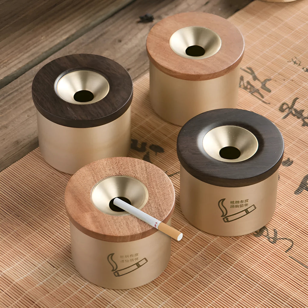 Retro brass-coloured copper ashtray with a wooden lid featuring a central hole
