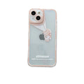 Transparent iPhone case with blue astronaut print showing phone through clear silicone and TPU material