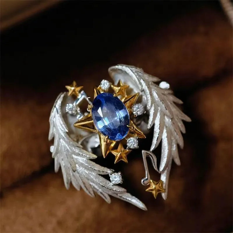 Geometric adjustable alloy ring with open mouth design showing metallic finish
