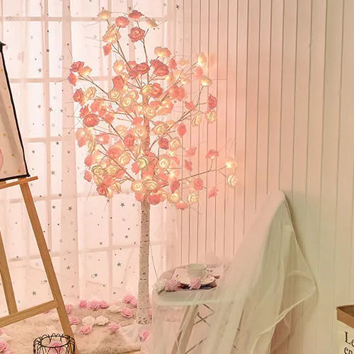 60cm Christmas rose shining tree lamp with pink and white flower-shaped PVC lights on a tabletop