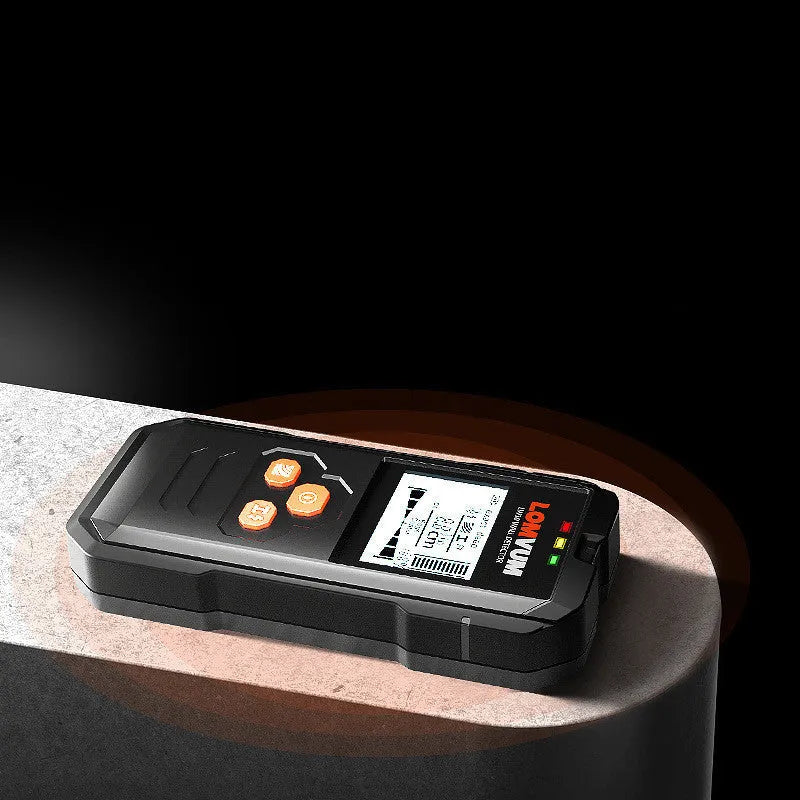Multifunctional wall detector unit held against a plasterboard wall showing detection depth display