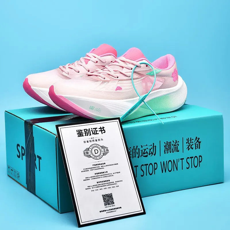 Low-top adult racing sneaker in Glacier colour with PU mesh upper, stitching detail, and natural rubber sole.