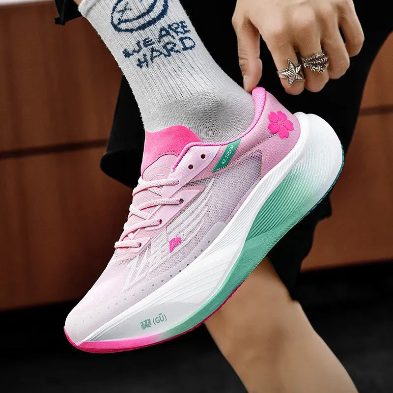 Low-top adult racing sneaker in Glacier colour with PU mesh upper, stitching detail, and natural rubber sole.