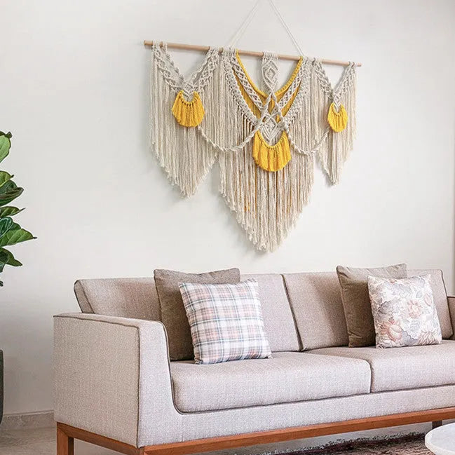 Rectangular creamy white cotton tapestry with colour woven details measuring 120cm by 95cm
