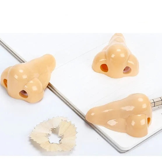 Flesh colour geometry-shaped plastic pencil sharpener with big nostril opening for pencils