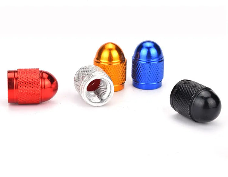 Aluminium mountain bike tyre valve cap shown in five colour options: black, blue, gold, silver, and red.