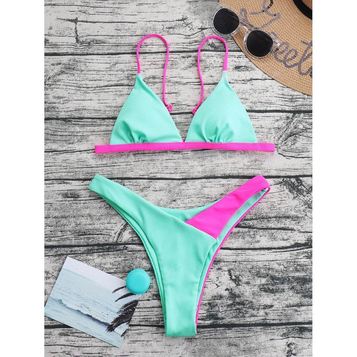 Women's two-piece nylon swimsuit briefs in European American style on a mannequin.