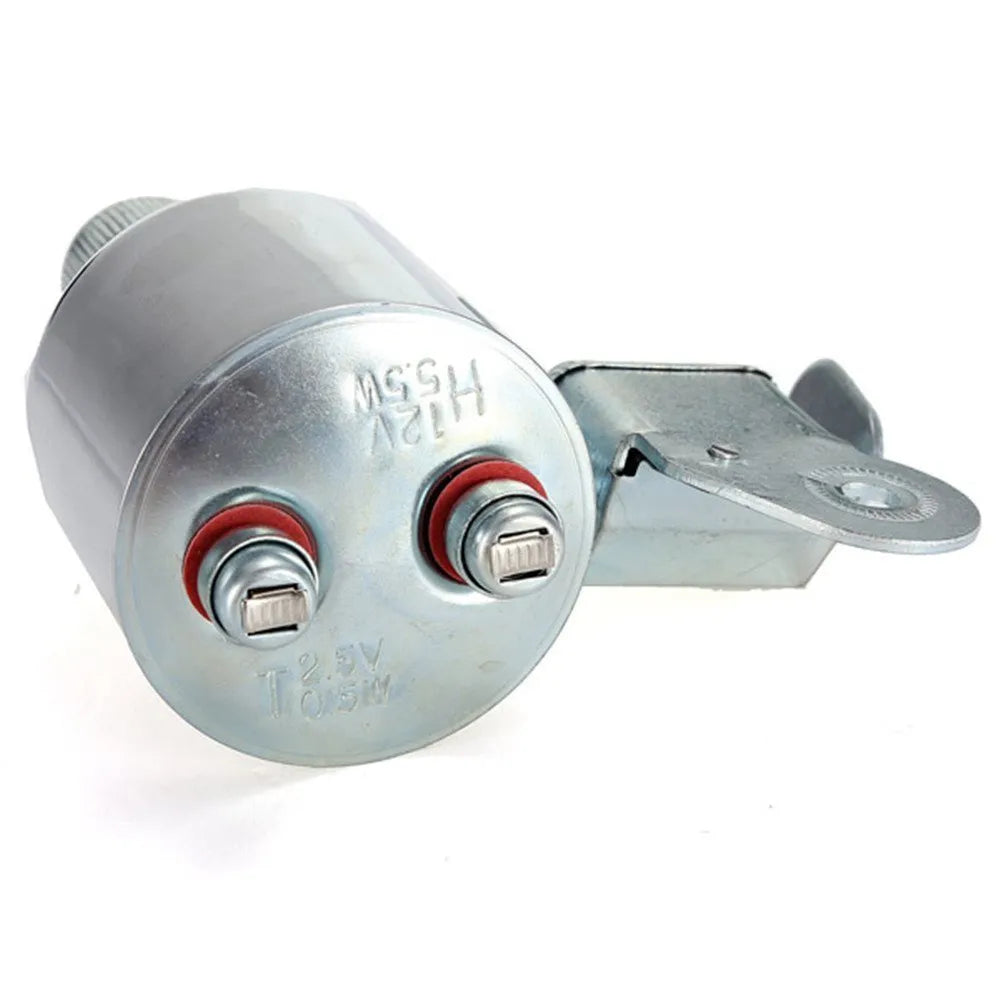 Silver aluminium bicycle dynamo light kit mounted on a bike fork for friction-powered lighting.