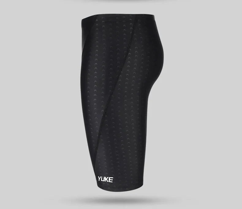 Men's black polyester swimming set with trunks, anti-fog goggles, waterproof cap, ear plugs, nose clip, and carry bag