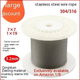 Close-up of a coated stainless steel anti-theft security cable showing its multi-strand construction.