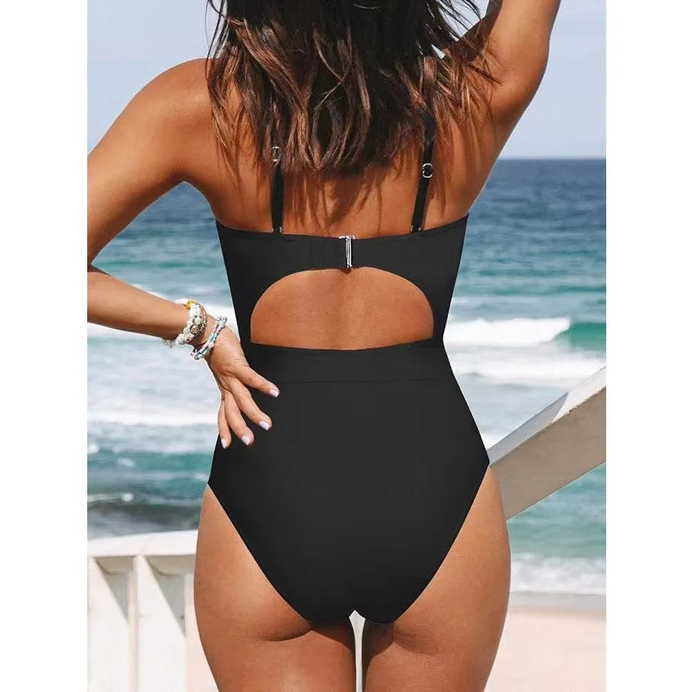 Women's solid colour backless one-piece swimsuit in polyester fabric.