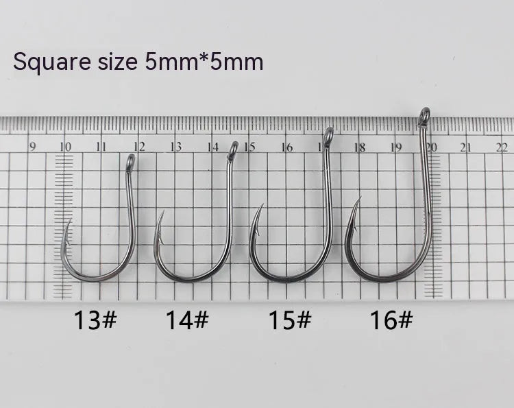 Bulk pack of barbed alloy carbon steel fishing hooks in various sizes for sea fishing.