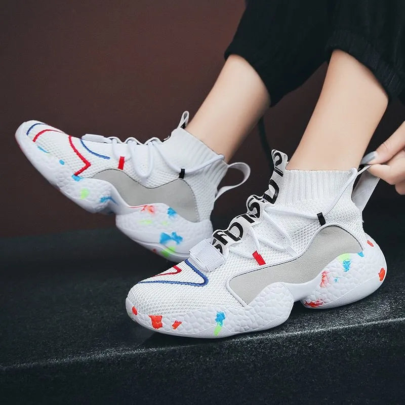 Men's camouflage patterned sneakers with mesh upper and flat rubber sole.