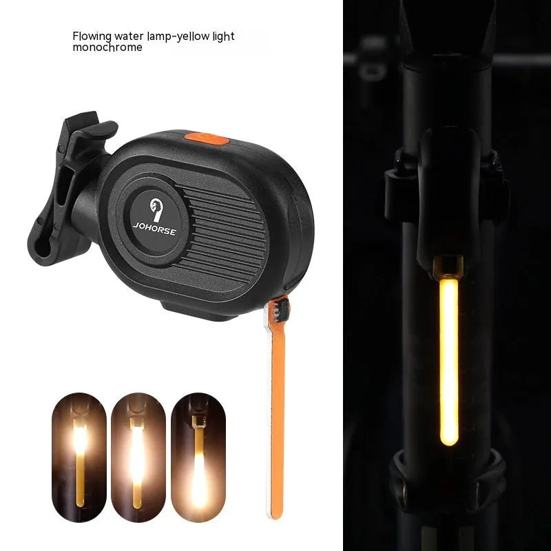 Bicycle running water taillight showing blue waterfall light effect on a bike seat post