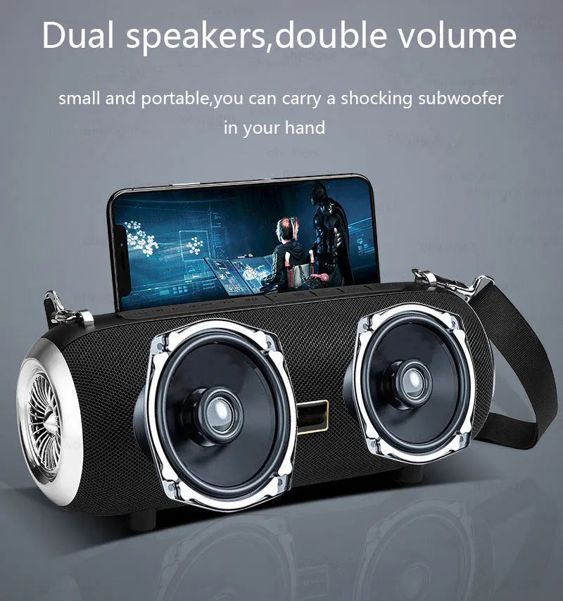 F666 Mini portable Bluetooth speaker with fabric mesh finish, shoulder strap, and standing next to a mobile phone.