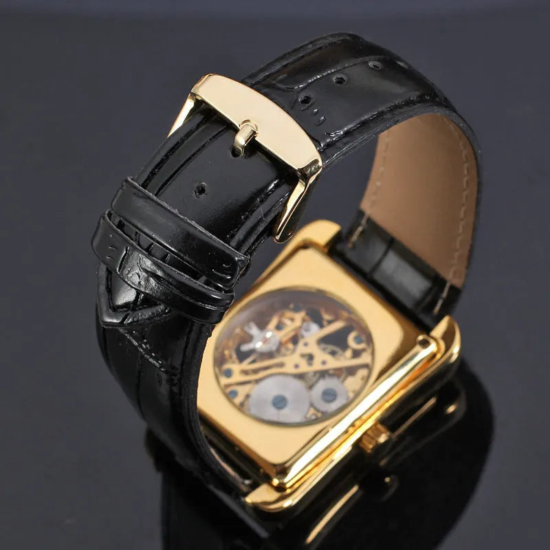 Winner men's fashion casual Swiss hollow manual mechanical watch with gold dial and black leather strap