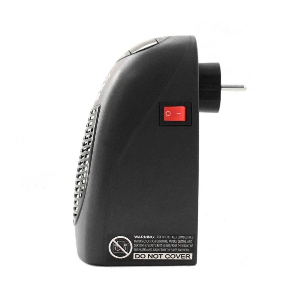 Black compact ceramic electric heater with digital display and rotating plug on a flat surface.