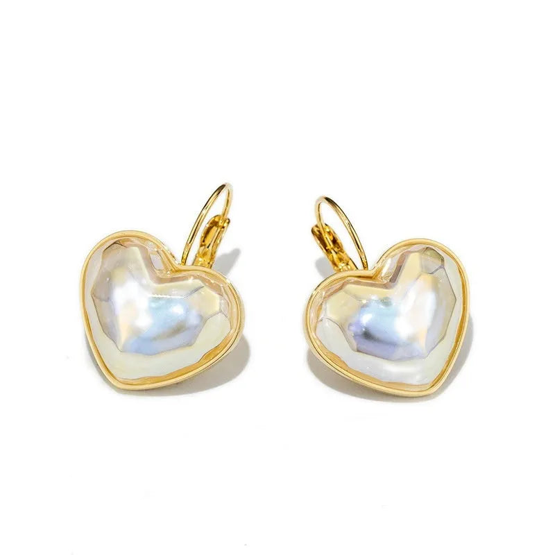 Gold colour alloy ear clips with metal elements and natural style for women