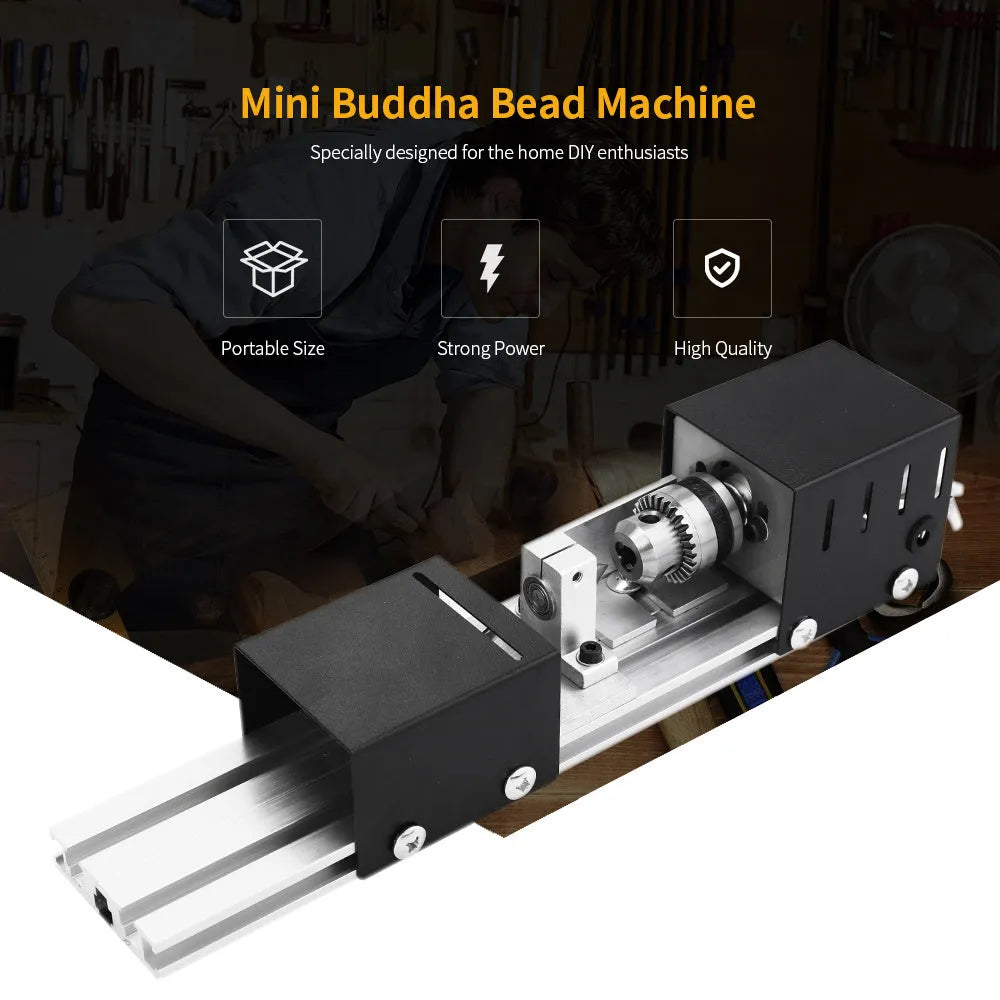 Compact silver metal mini manual woodworking lathe with carving knives on a benchtop