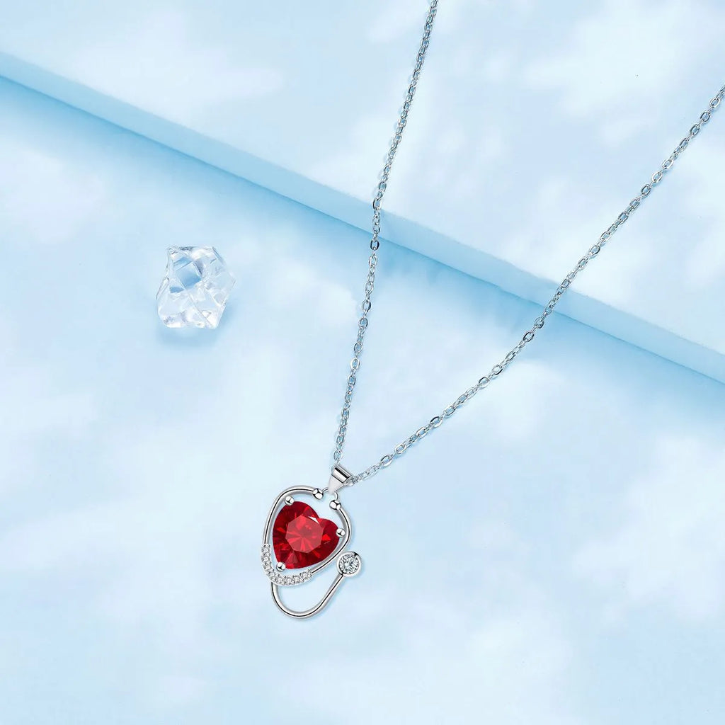 Red diamond stethoscope necklace with wings cross pendant on copper chain