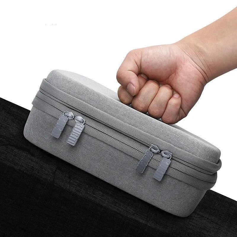 Black and grey EVA digital storage bag for organising headphones, cables, and small electronics.