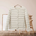 Women's lightweight cotton-padded jacket in solid colour, loose fit, long sleeves, autumn winter wear