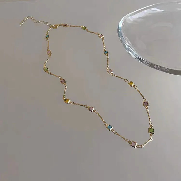 Square colour clavicle chain necklace with geometric artificial crystal design in gold and white K finish options