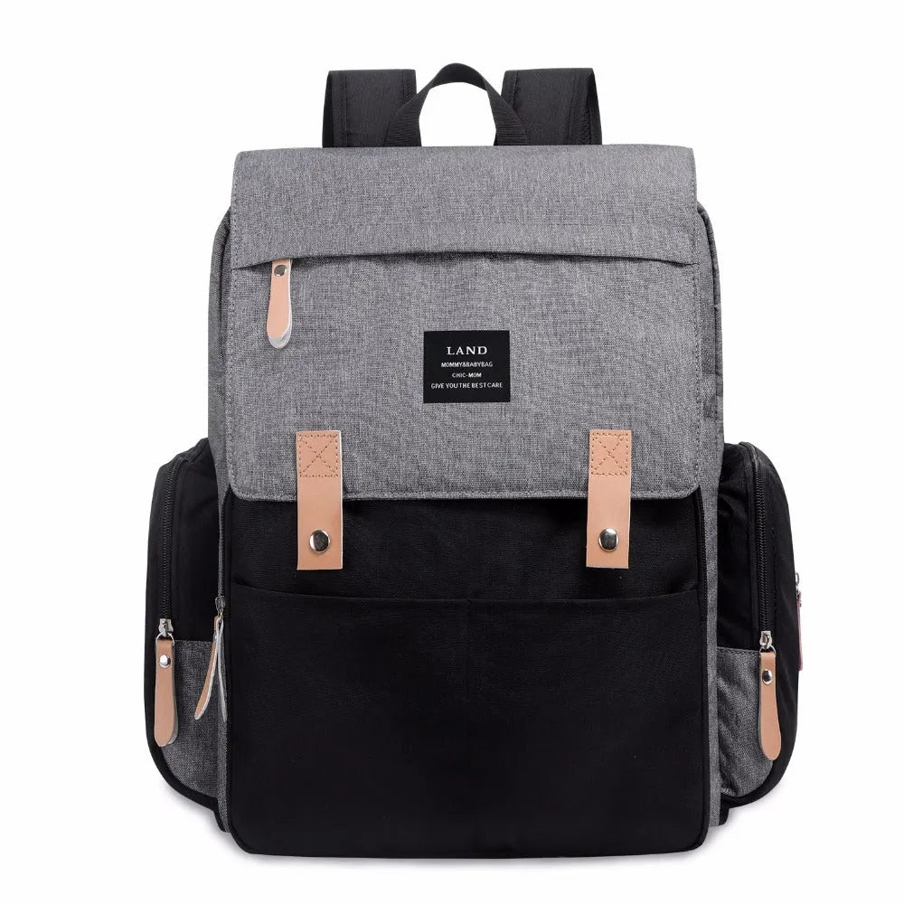 LAND Mommy large oxford cloth diaper backpack with changing mat, shown in grey colour.